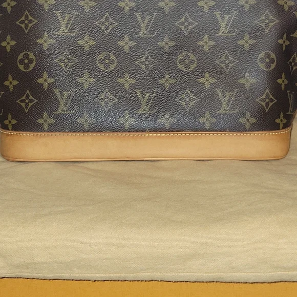 LOUIS VUITTON Alma monogram - Picture 8 of 16